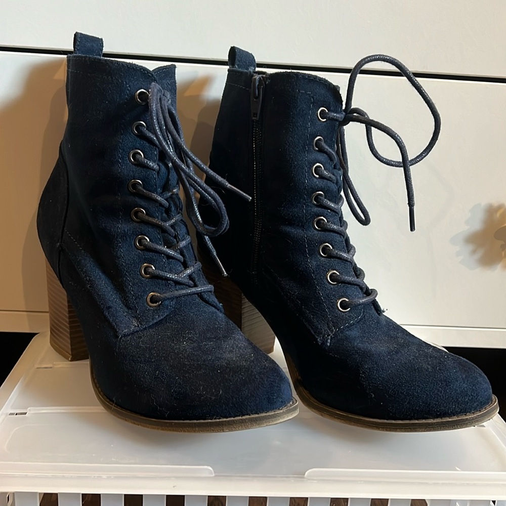 Dark blue heeled boots, ~3in. Heel